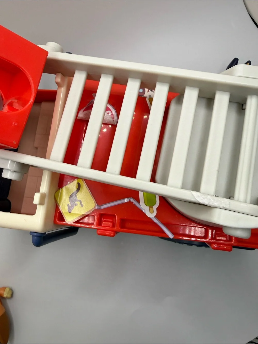 Disney Bluey fire truck playset toy with bingo bluey figure